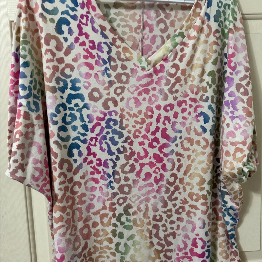 Vibrant Multicolor Leopard Print V-Neck Women's Top. Boutique